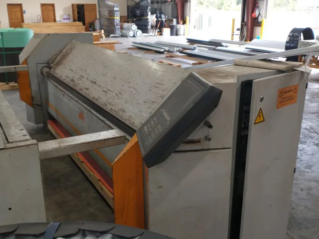 RAS CNC Folder 2003